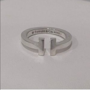Tiffany Sterling Silver “T” Ring. Never worn $500 retail for size 8.5.